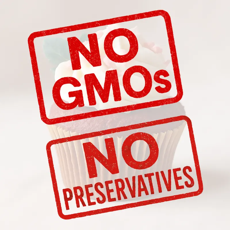No GMOs and no preservatives label on cupcake, highlighting clean-label baking powder made with safe and natural ingredients