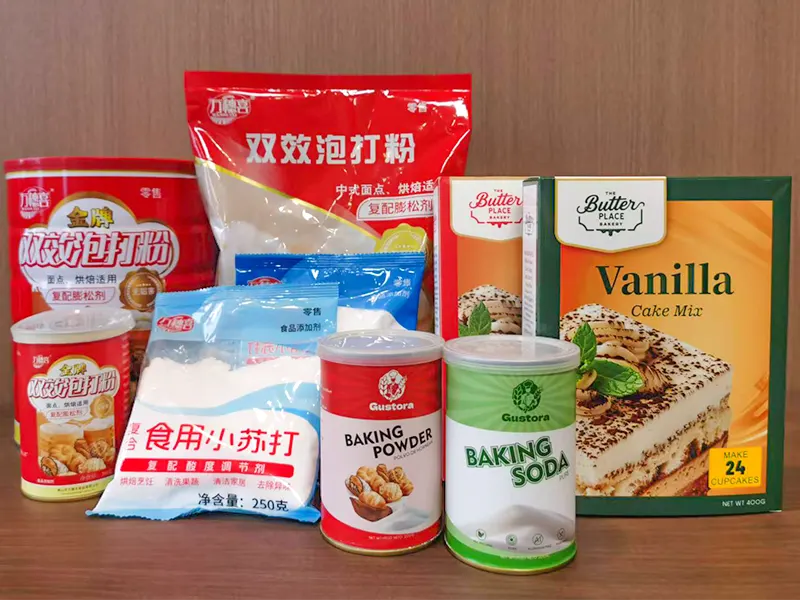 Various baking powder, baking soda, and cake mix packaging samples including Gustora OEM designs, showcasing custom printed food packaging solutions