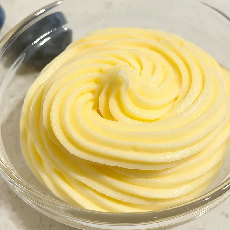 Smooth and glossy custard mixture with fine texture, made from premium custard powder for perfect creamy consistency in desserts