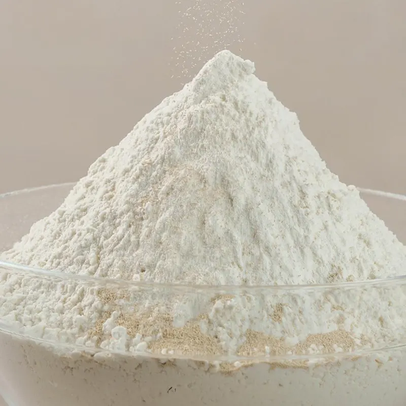 Fine instant dry yeast powder piled in a glass bowl, ideal for fast dough fermentation and improved baking efficiency.