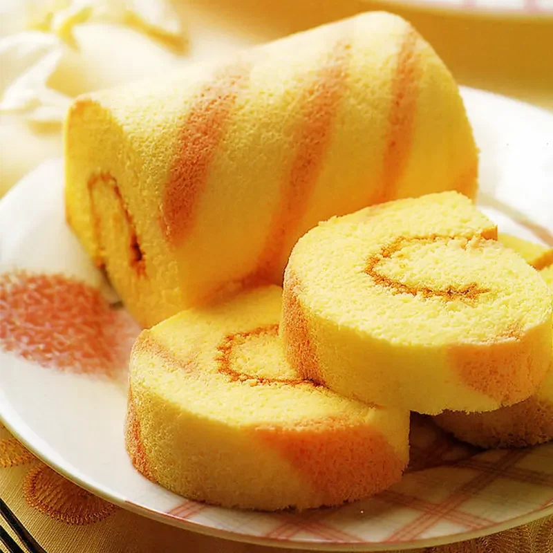 Soft and fluffy Swiss roll cake made with high-quality cake premix, featuring a light texture and mineral-free clean baking result
