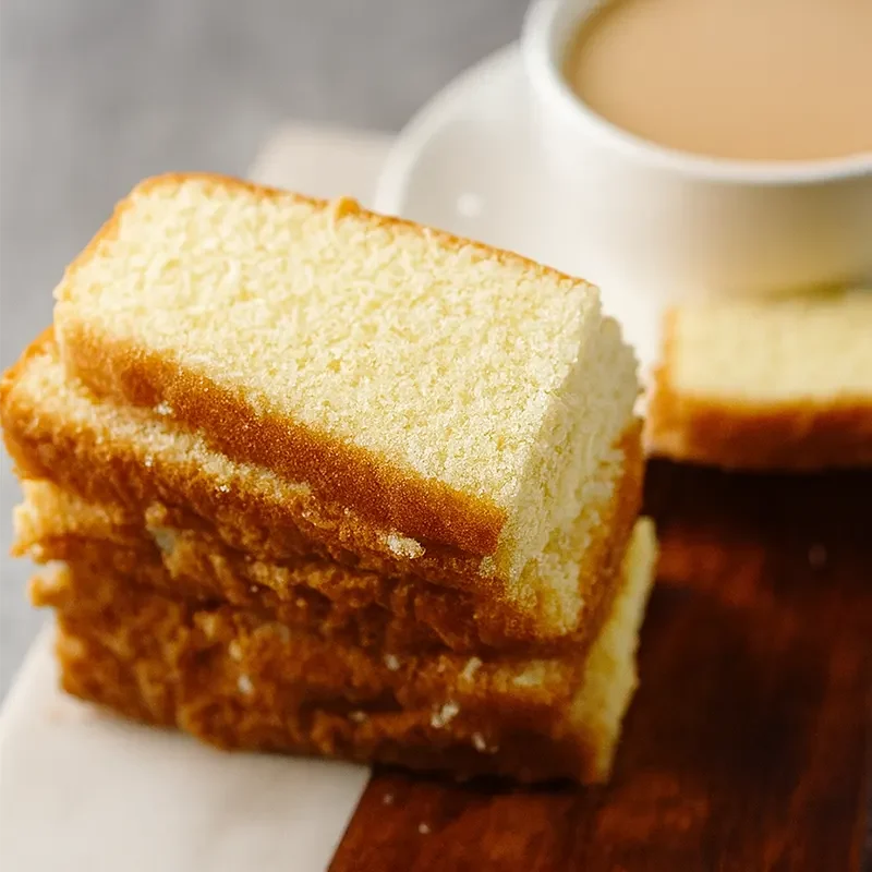 Sliced butter sponge cake made with premium cake premix, showcasing soft texture and golden crust—ideal for clean label and mineral-free baking