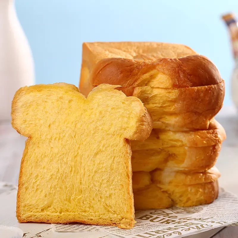Fluffy golden sliced toast made with premium instant dry yeast, ideal for soft texture and rich flavor in every bite.