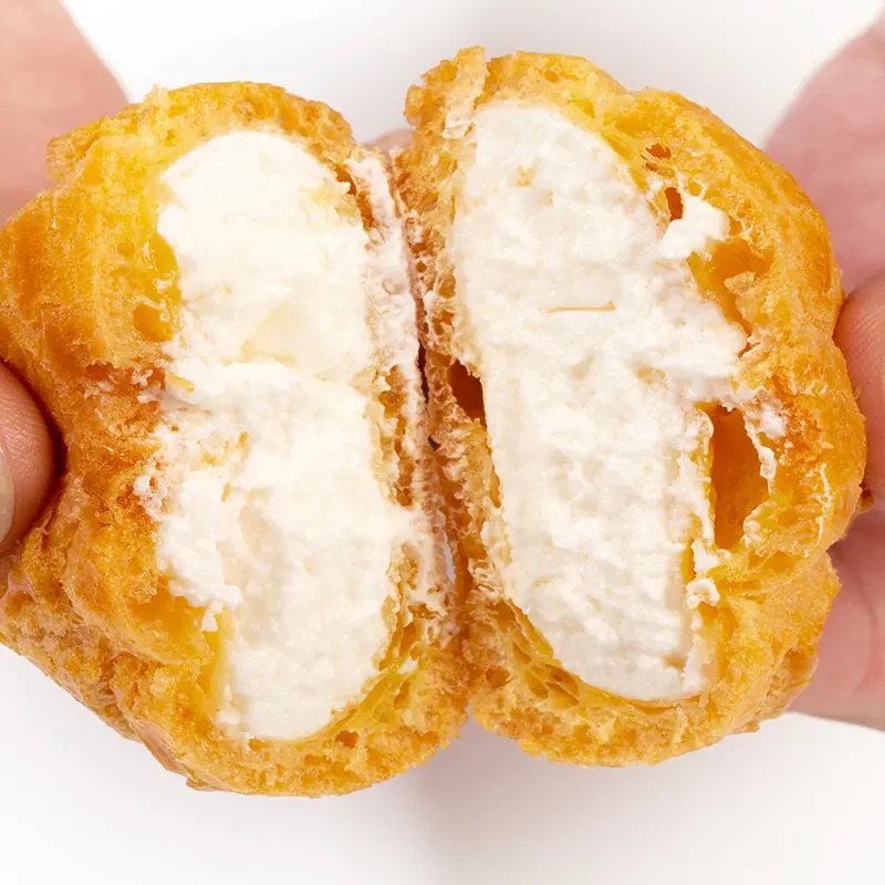 Golden choux pastry filled with rich, creamy custard. perfect for custard powder lovers and professional dessert applications