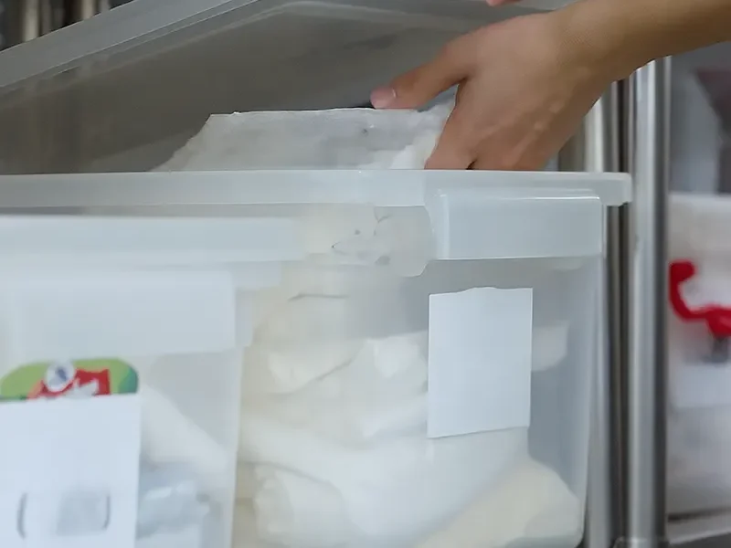 Formulated baking powder ingredients stored in sealed containers, used to improve cupcake texture and reduce raw material costs for manufacturers