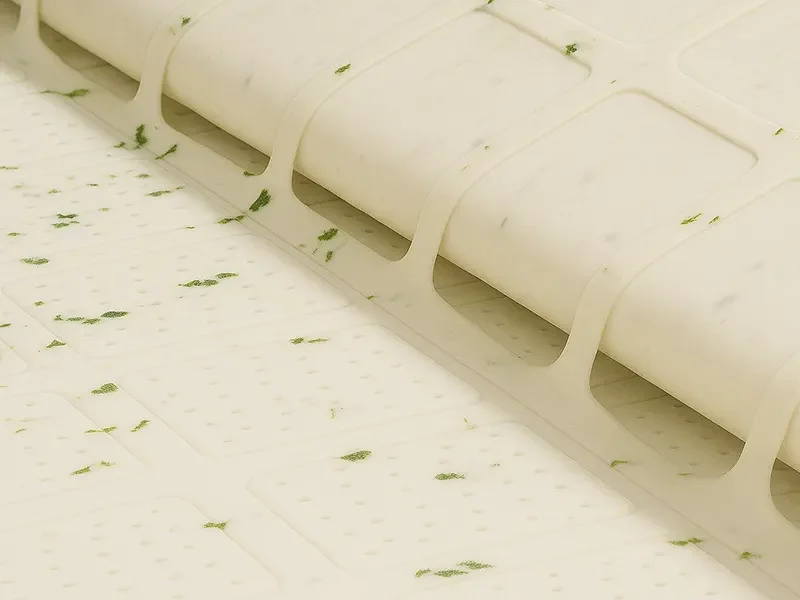 Precision-cut herb cracker dough on automated production line, showcasing baking soda's role in texture control and high-efficiency snack manufacturing