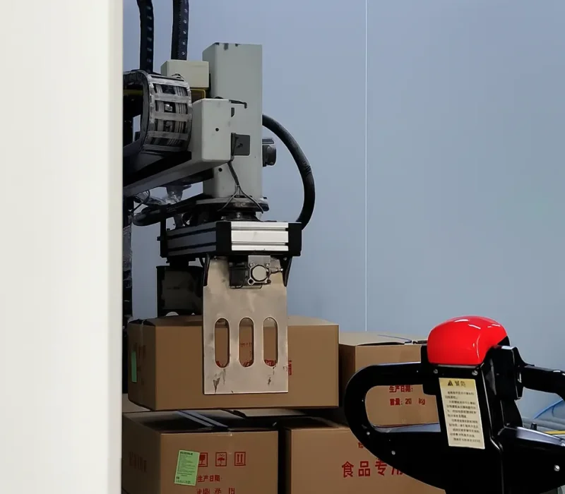 Automated food production line with robotic arms for stacking and handling, enhancing efficiency and showcasing modern intelligent manufacturing